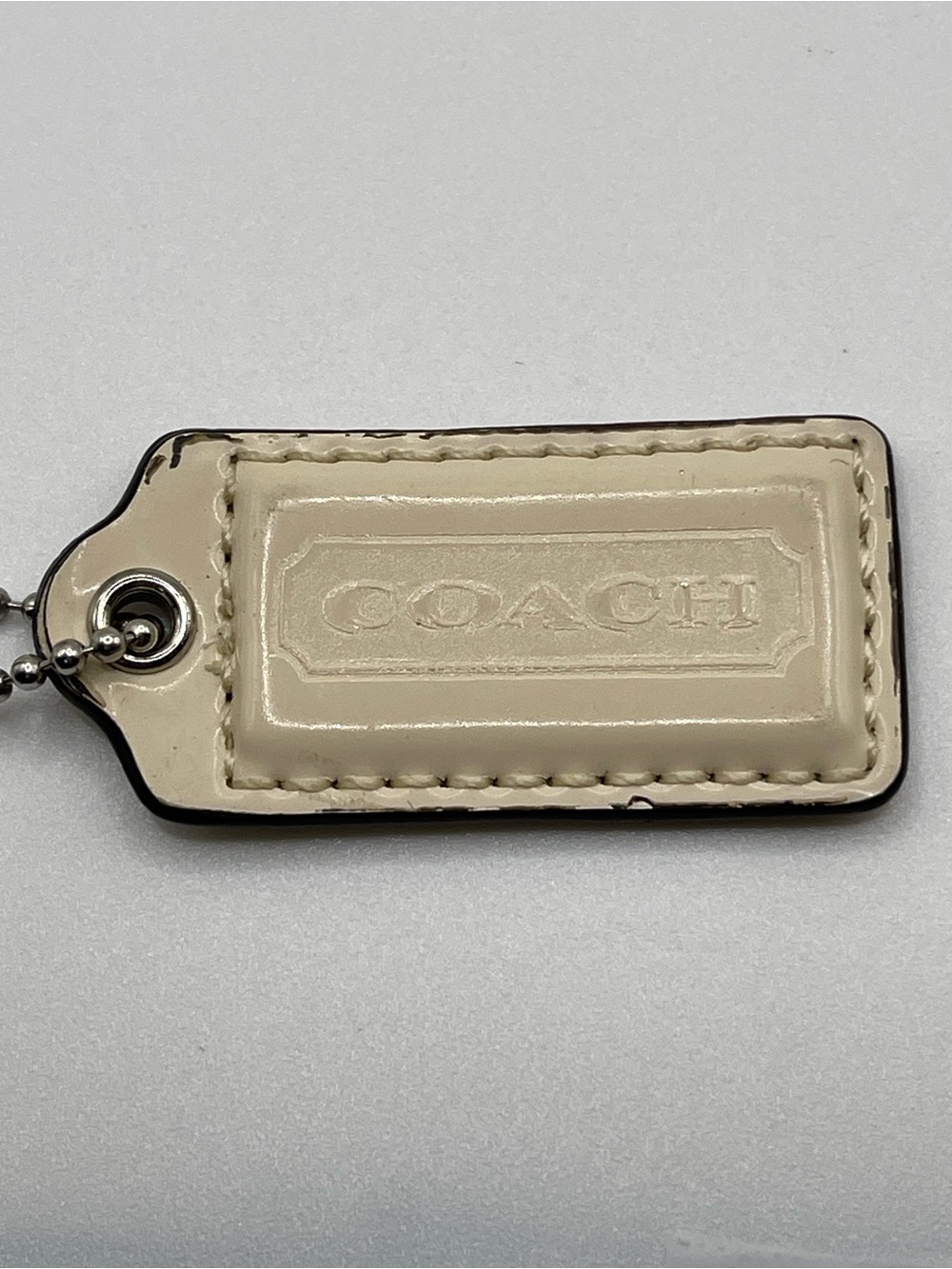 Coach Cream Leather Hang Tag with Ball Chain